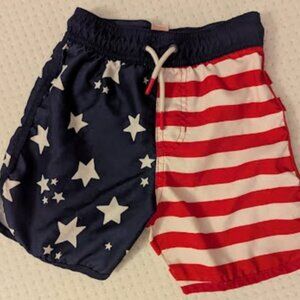 red,white, and blue swim trunks